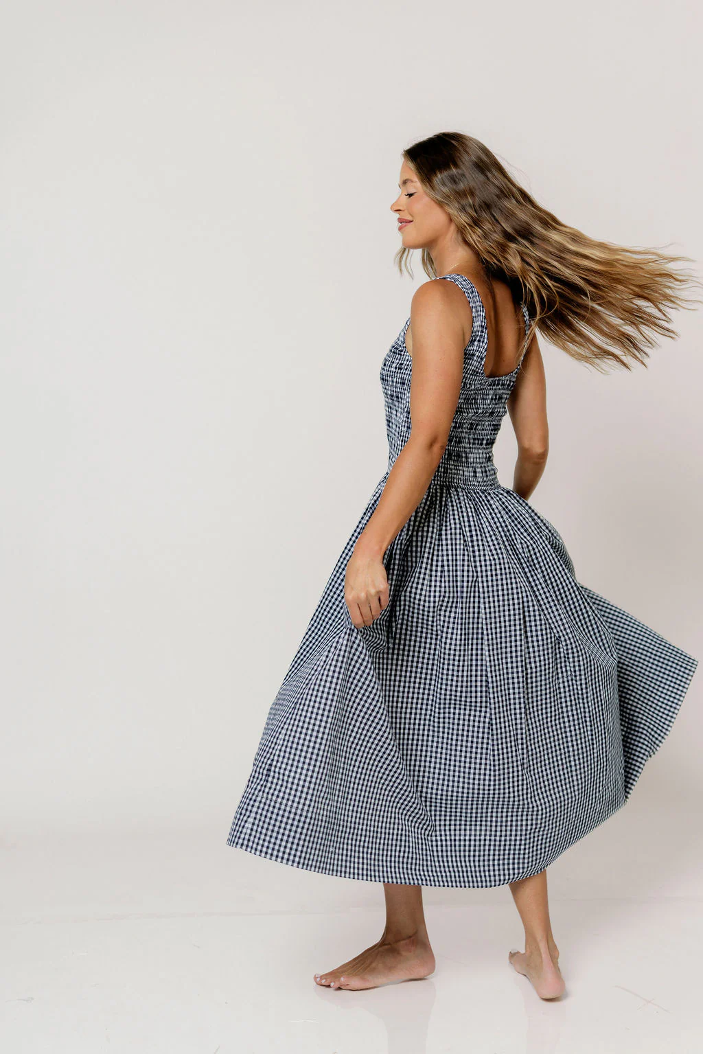 Janice 100% Cotton Gingham Smocked Midi Dress in Navy - Image 5