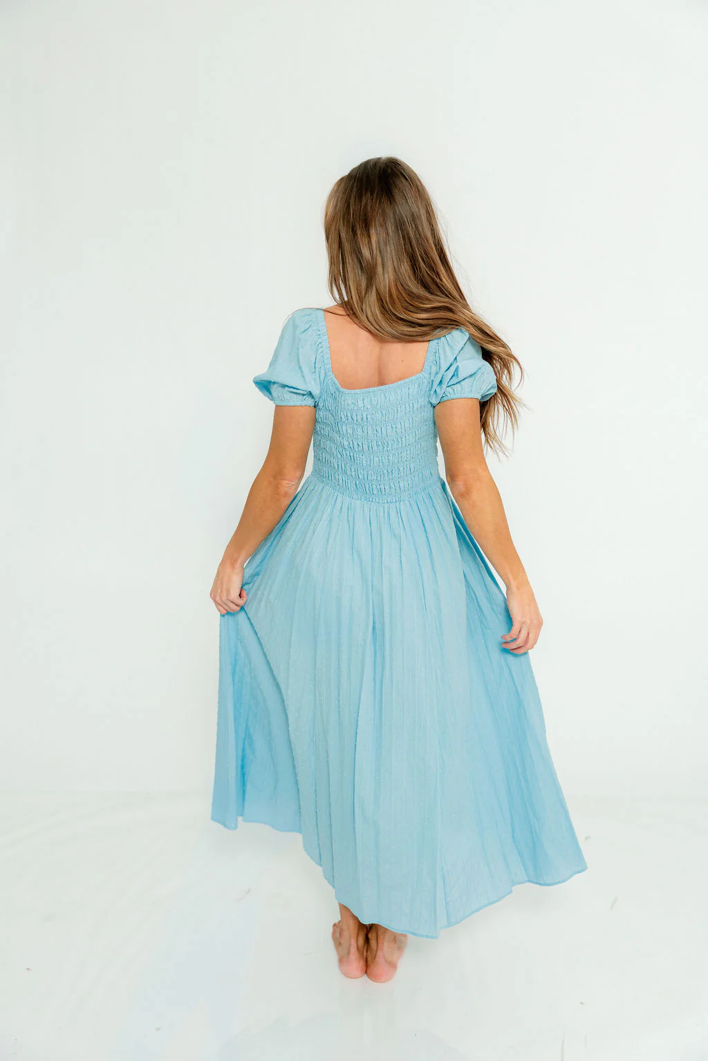 Arabelle Smocked Bow Detail Maxi Dress in Blue Aura - Image 7
