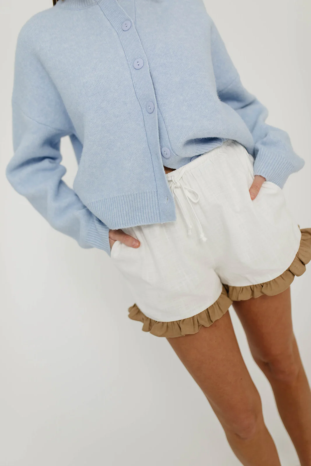 Dawn Ruffled Hem Linen Shorts in White/Tan - Image 14