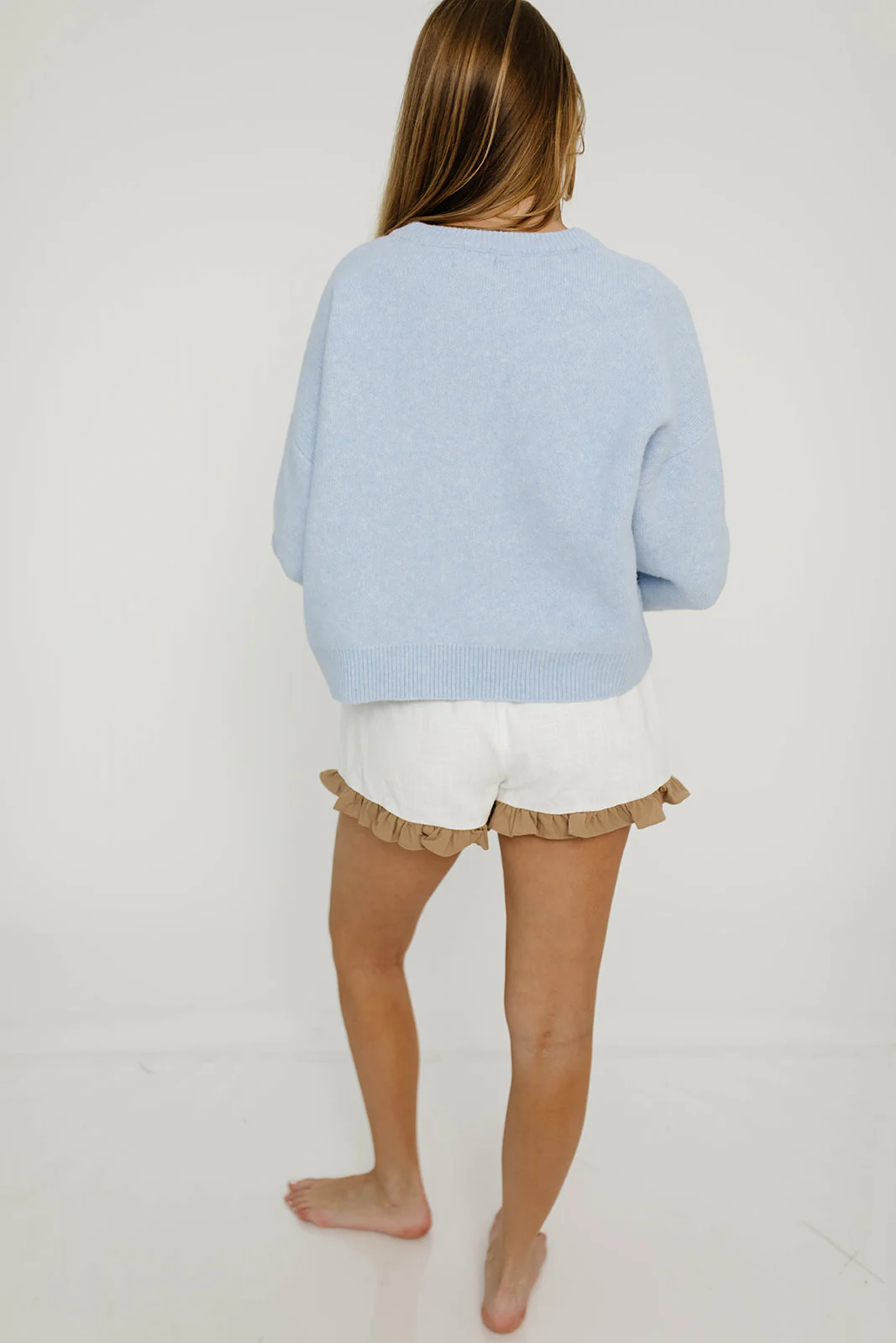 Dawn Ruffled Hem Linen Shorts in White/Tan - Image 15